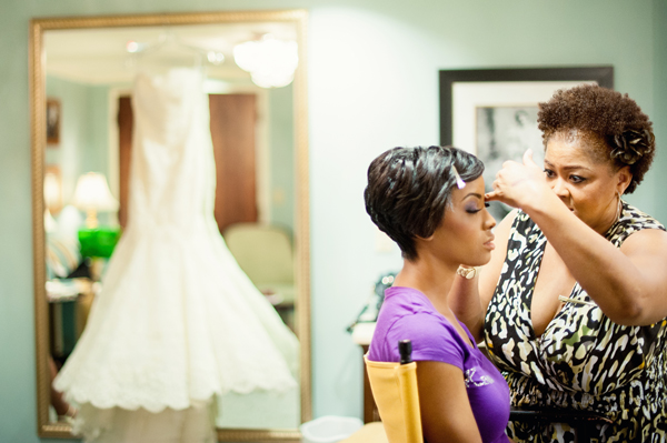 bride getting hair styled