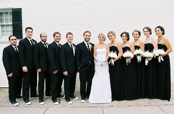 black suits and black brides maids dresses