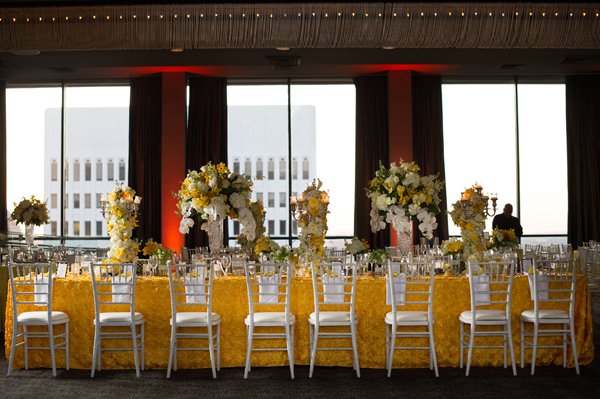 yellow table linen, yellow and white wedding flowers