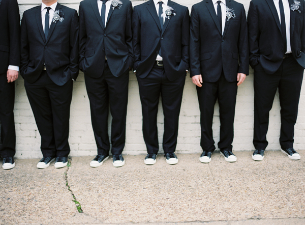 groomsmen wearing black suits