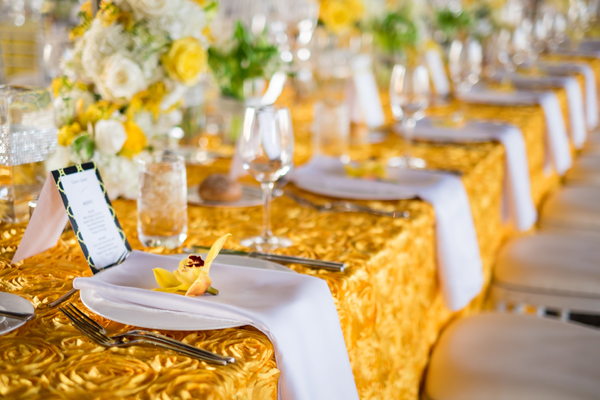 yellow and white reception decor, yellow orchids