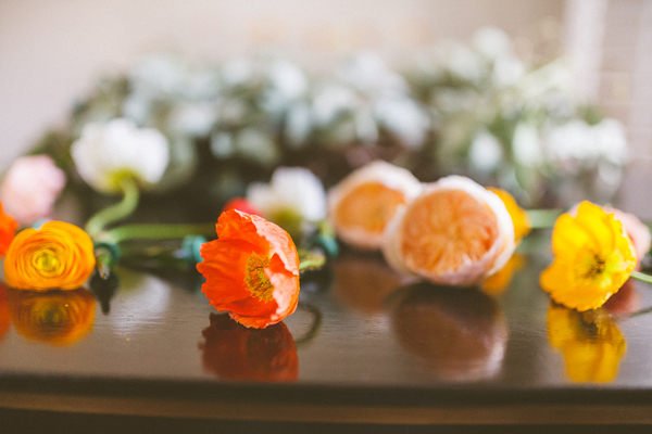 Orange poppies, yellow ranunculus, gardend roses