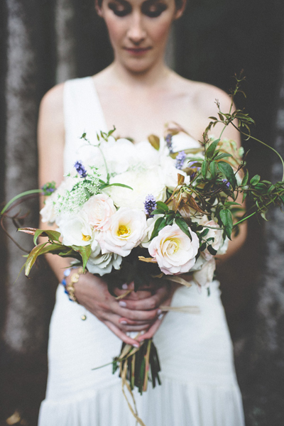 bridal bouquet by the flowering vine