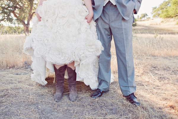 bride wearing cowboy boots