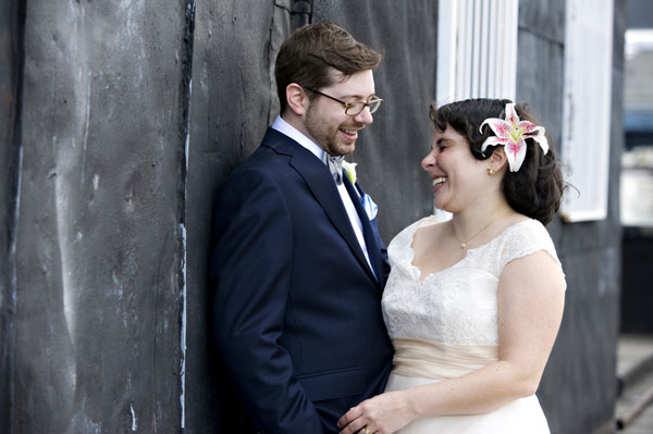 bride and groom laughing