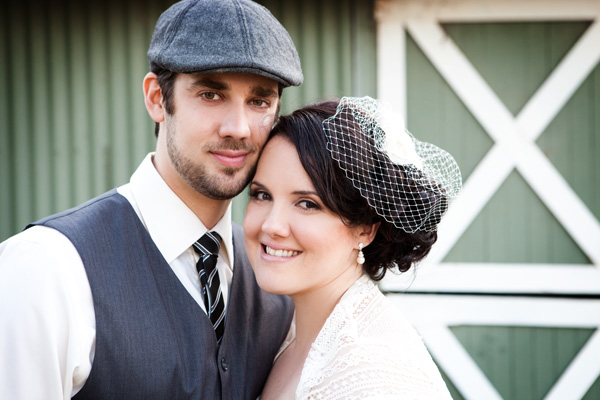 bride with veil, groom with cap