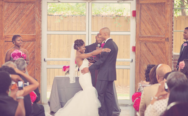 bride and groom at the alter