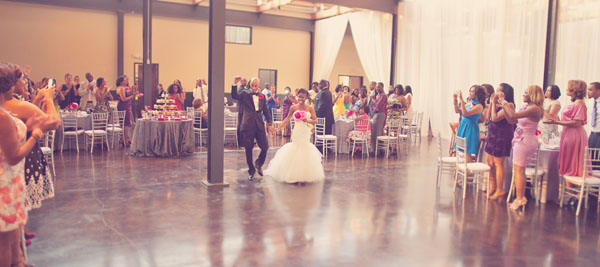 bride and groom enter reception